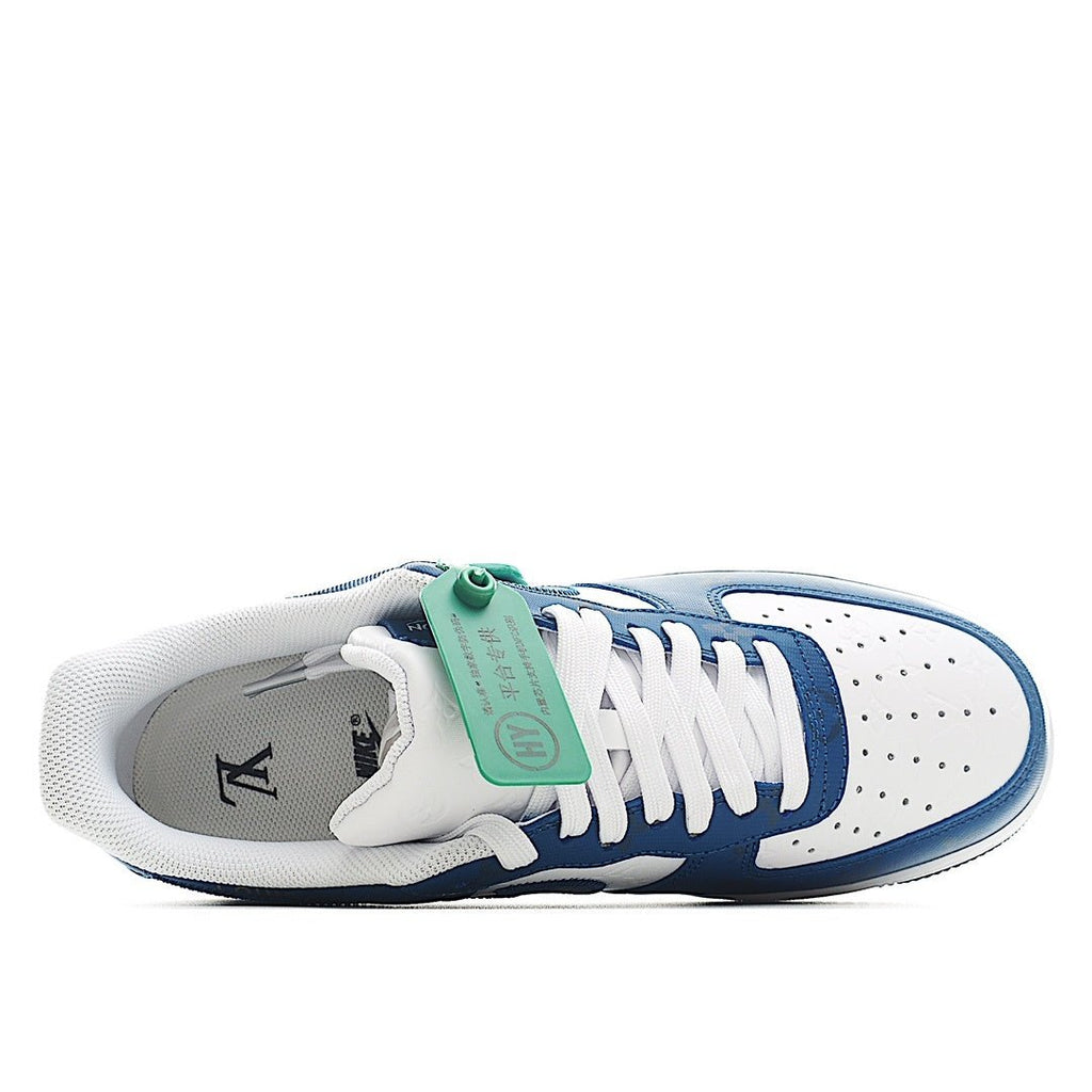 Air Force 1 sneakers in blue and white with white laces and green hang tag