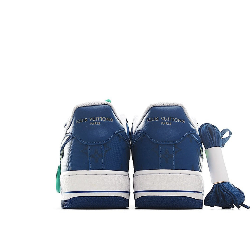 Pair of Air Force 1 sneakers in blue with white midsole and green side tassel