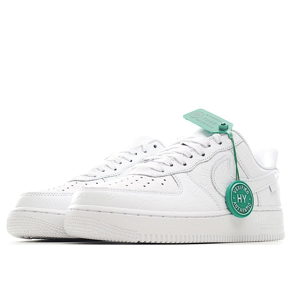 White Air Force 1 sneakers side view with mint green HY authenticity tag