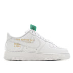 White Air Force 1 sneakers heel with decorative text patch and mint green tag