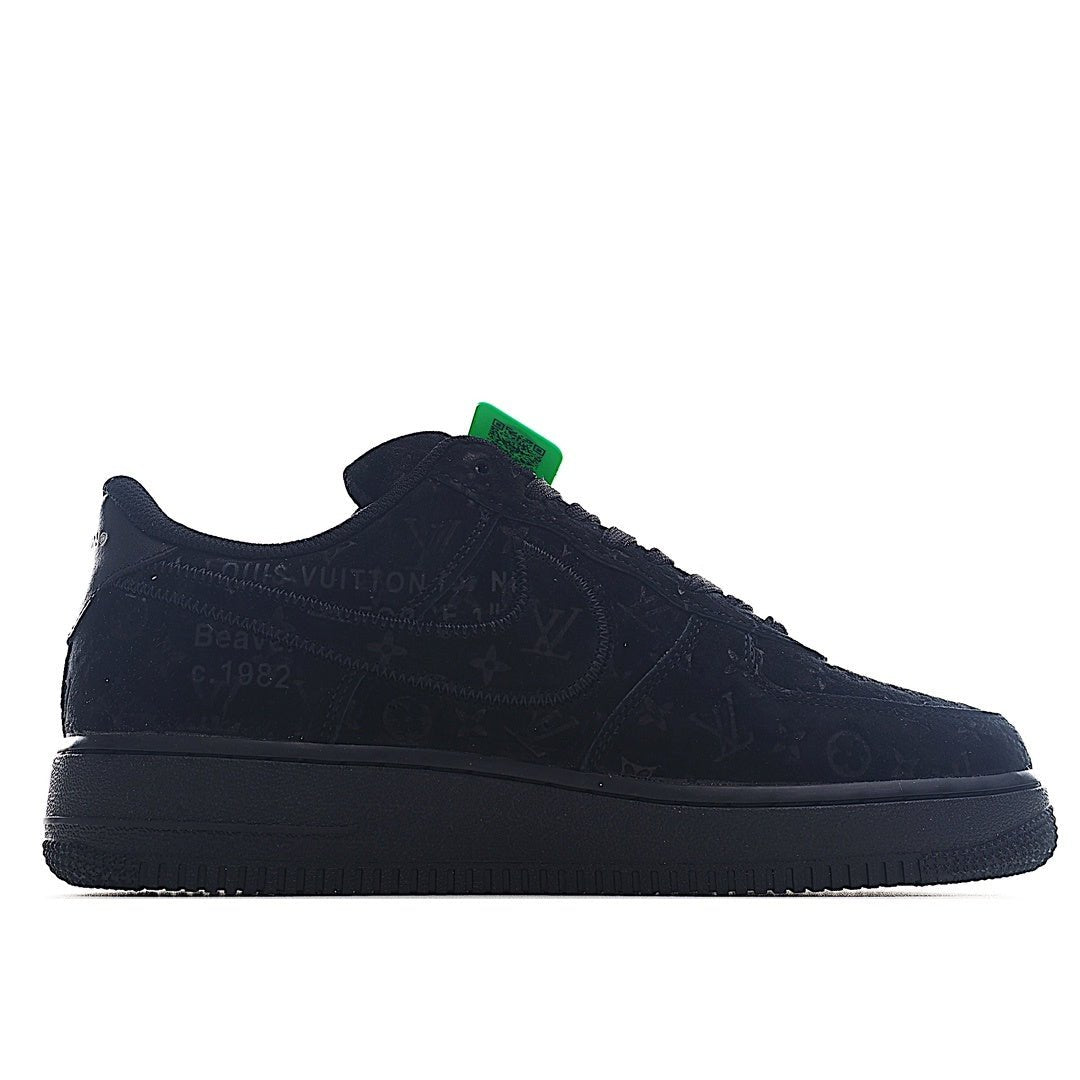 Black low-top lace-up sneaker with textured logo panels and green tag