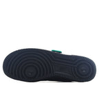 Black sneaker outsole with circular tread pattern