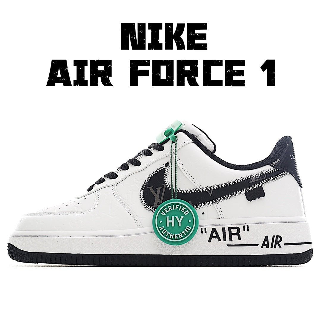 Air Force 1 sneakers, white leather with black laces, navy heel, green accent tab