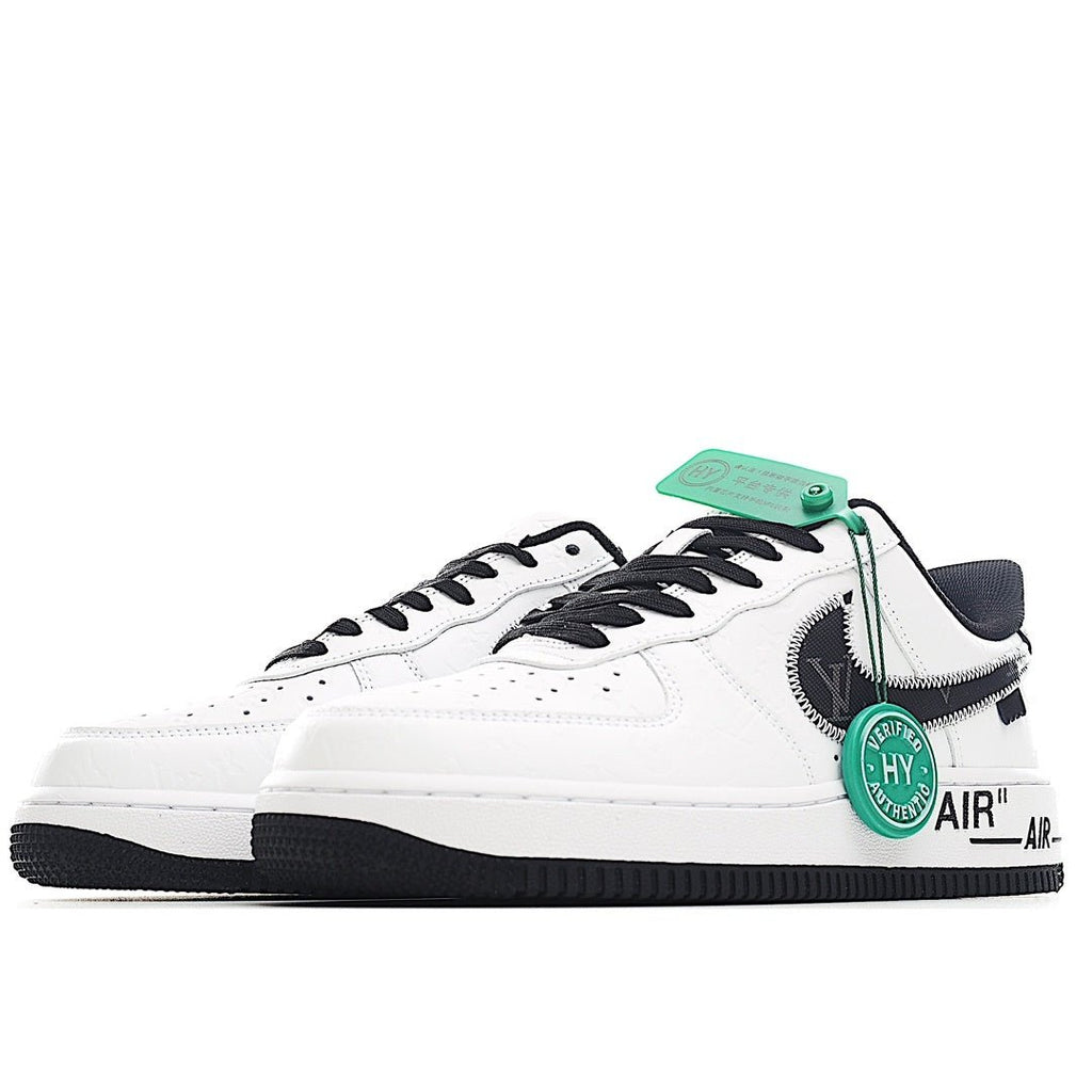 Air Force 1 sneakers, white leather with black laces and green accent at the side
