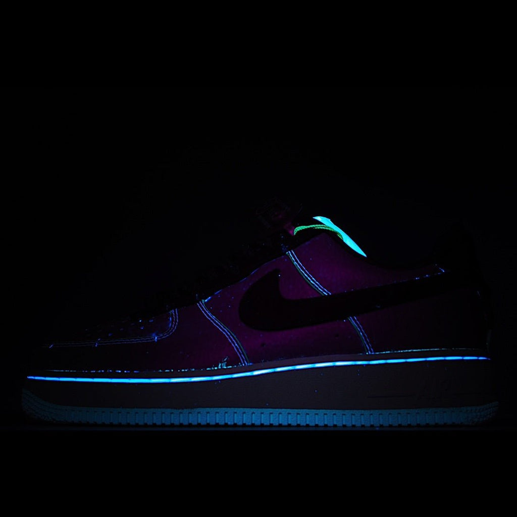 Nike Air Force 1 low-top sneakers in dark tones, neon blue outline and teal accents