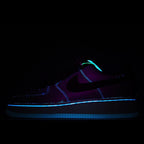 Nike Air Force 1 low-top sneakers in dark tones, neon blue outline and teal accents