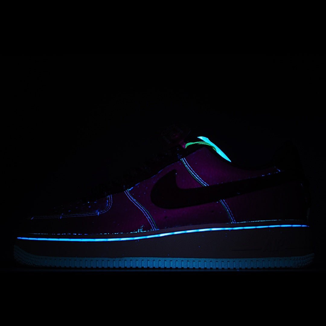 Nike Air Force 1 low-top sneakers in dark tones, neon blue outline and teal accents