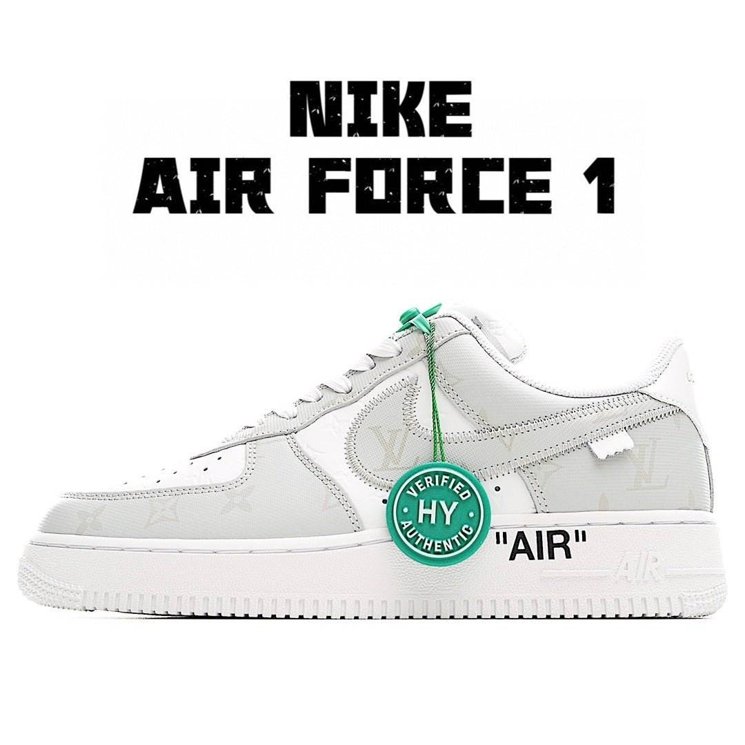 White Air Force 1 sneakers with green HY tag and 'AIR' heel detail