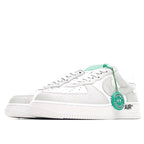 White Nike Air Force 1 low-top sneaker with green lace tag and AIR detail