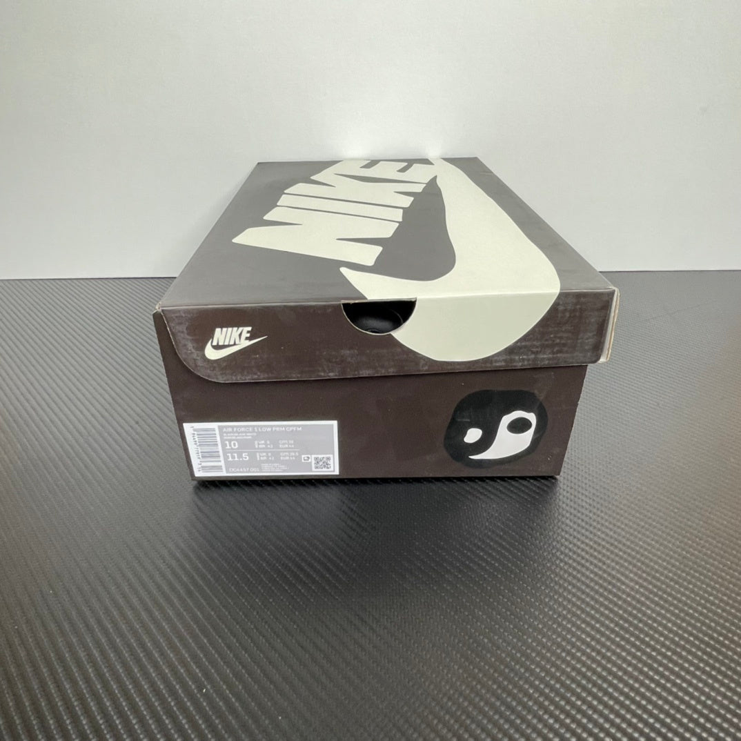 Nike Air Force 1 shoe box with black Nike logo and swoosh graphic