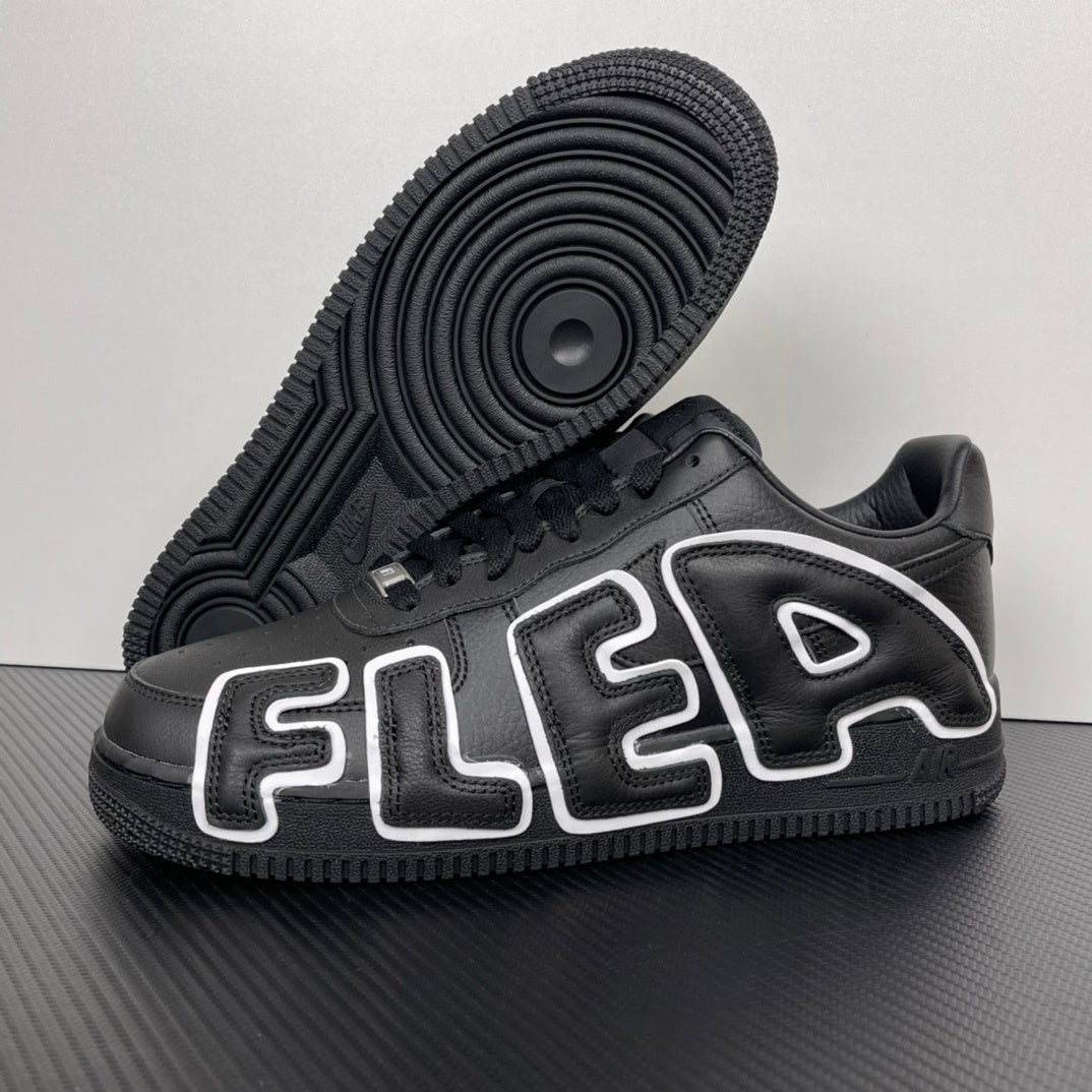 Black sneaker sole and toe view with raised FLEA-style lettering and tread pattern.
