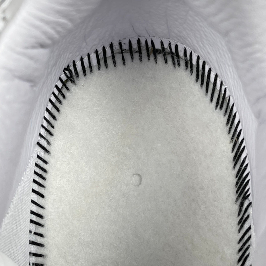 White sneaker outsole with black tread pattern