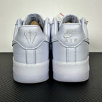 White leather low-top sneakers, heel tabs with embroidery, lace-up