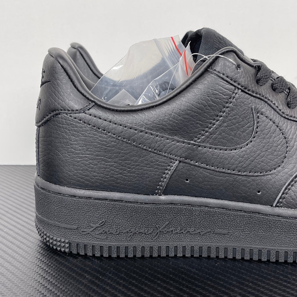Air Force 1 sneaker heel and side in dark gray leather, lace-up with swoosh detail