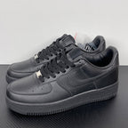 Air Force 1 sneakers front side view in dark gray leather, lace-up with swoosh