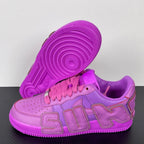 Purple Nike Air Force 1 sneakers with pink laces, outsole and side view